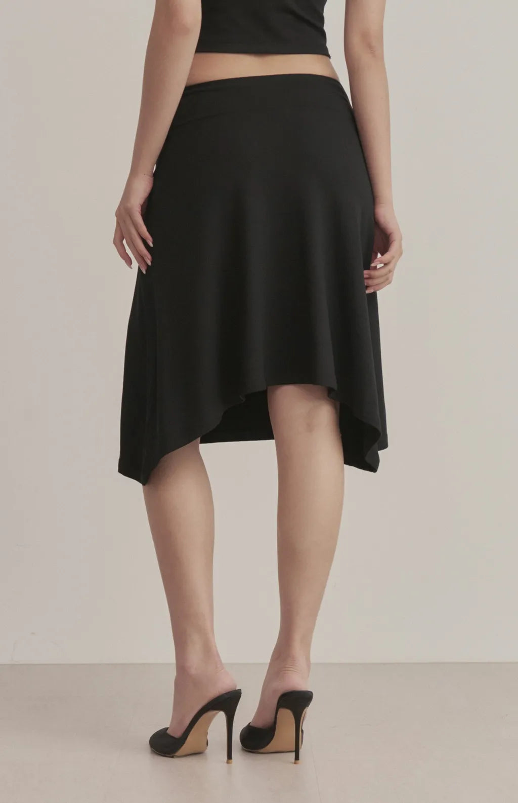 Asymmetric Flared Knit Midi Skirt<br/>不對稱傘擺中長裙