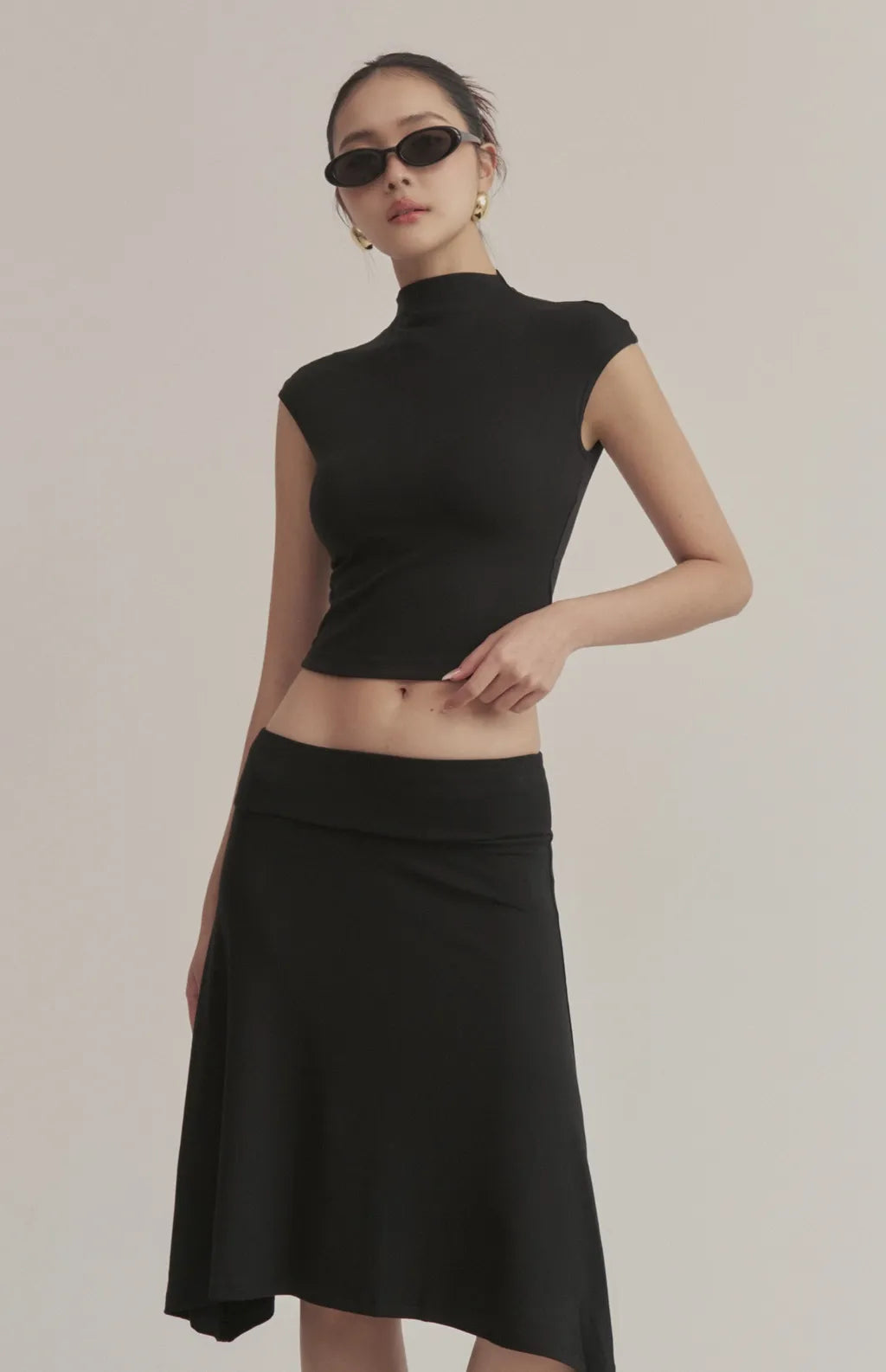 Asymmetric Flared Knit Midi Skirt<br/>不對稱傘擺中長裙